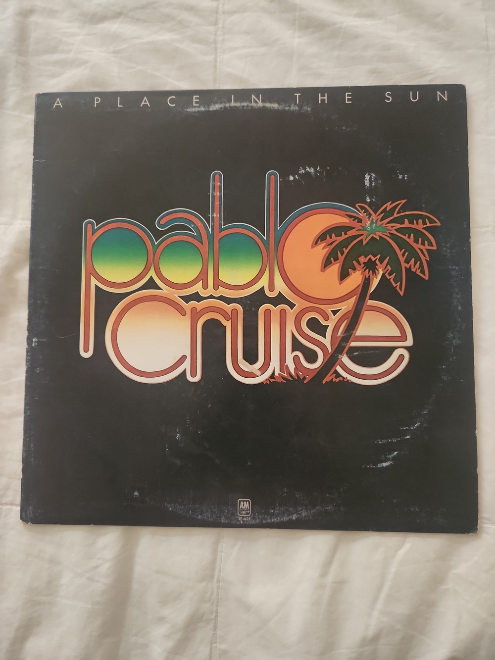 Pablo Cruise "A Place in the Sun" Vinyl Album - Never Played. Cover Has Wear